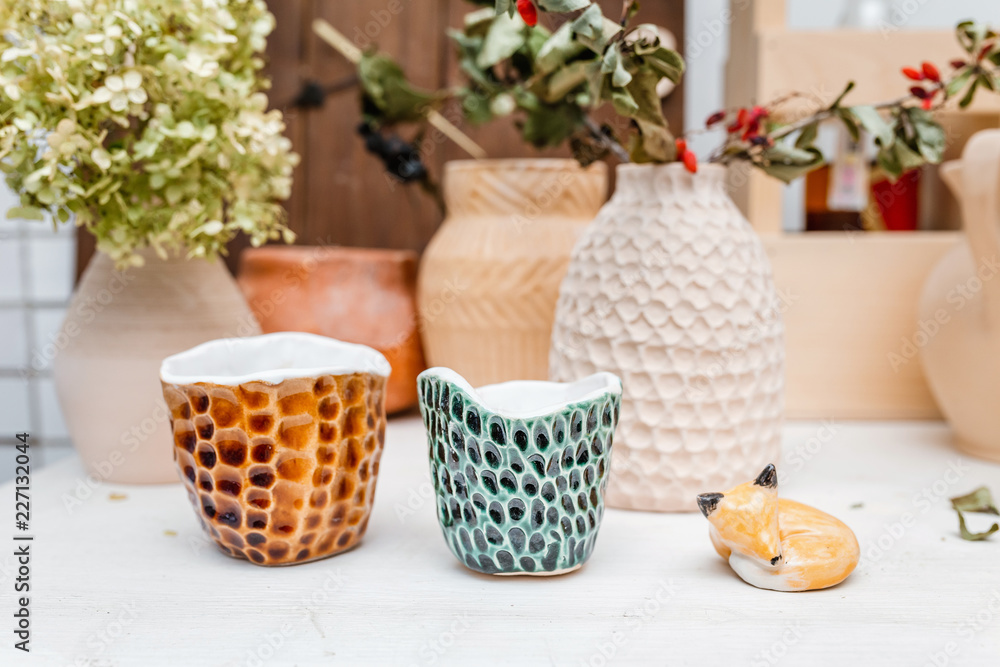 still life of the clay pottery teapot and cup and dishes still life of the clay pottery teapot and cup and dishes