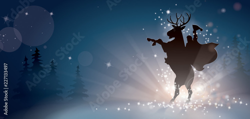 PÈRE NOËL SUR UN RENNE