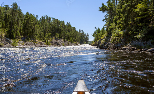 Paddling in the Quetico Provincial Park and Boundary Waters Canoe Area Wilderness photo