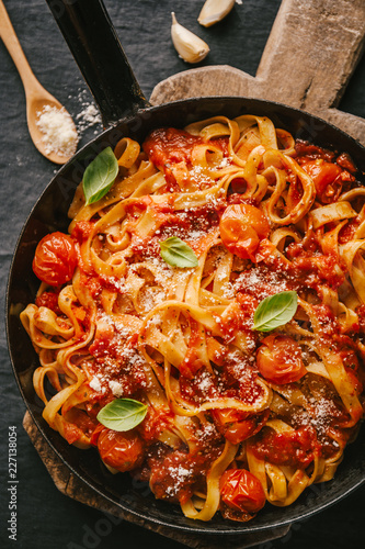 Tomato sauce spaghetti pasta on pan