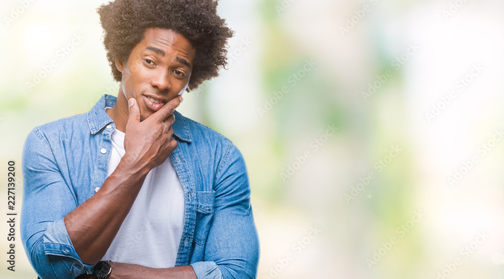Afro american man over isolated background thinking looking tired and bored with depression problems with crossed arms. Afro american man over isolated background thinking looking tired and bored with depression problems with crossed arms.