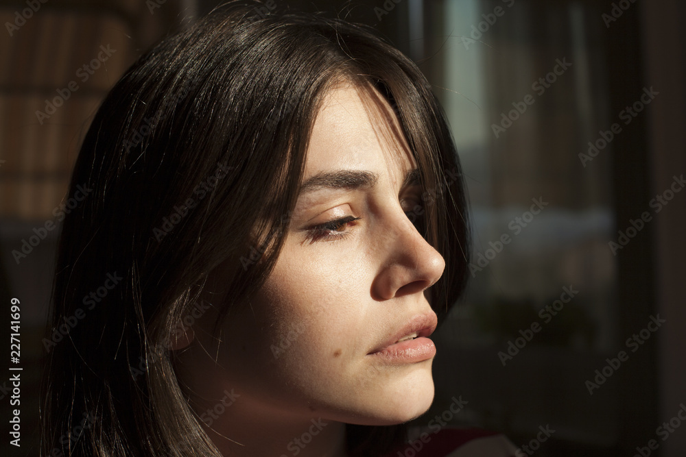 Young woman portrait; close up shot. Young woman portrait; close up shot.