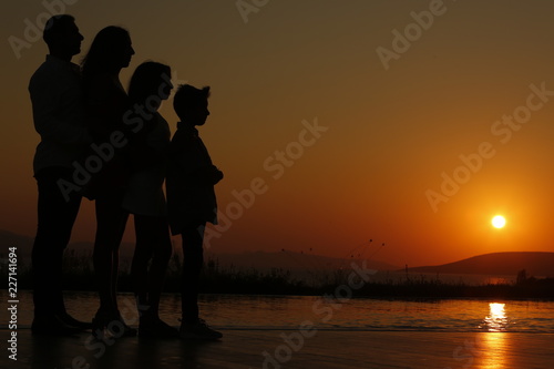 FAMILY AT SUNSET