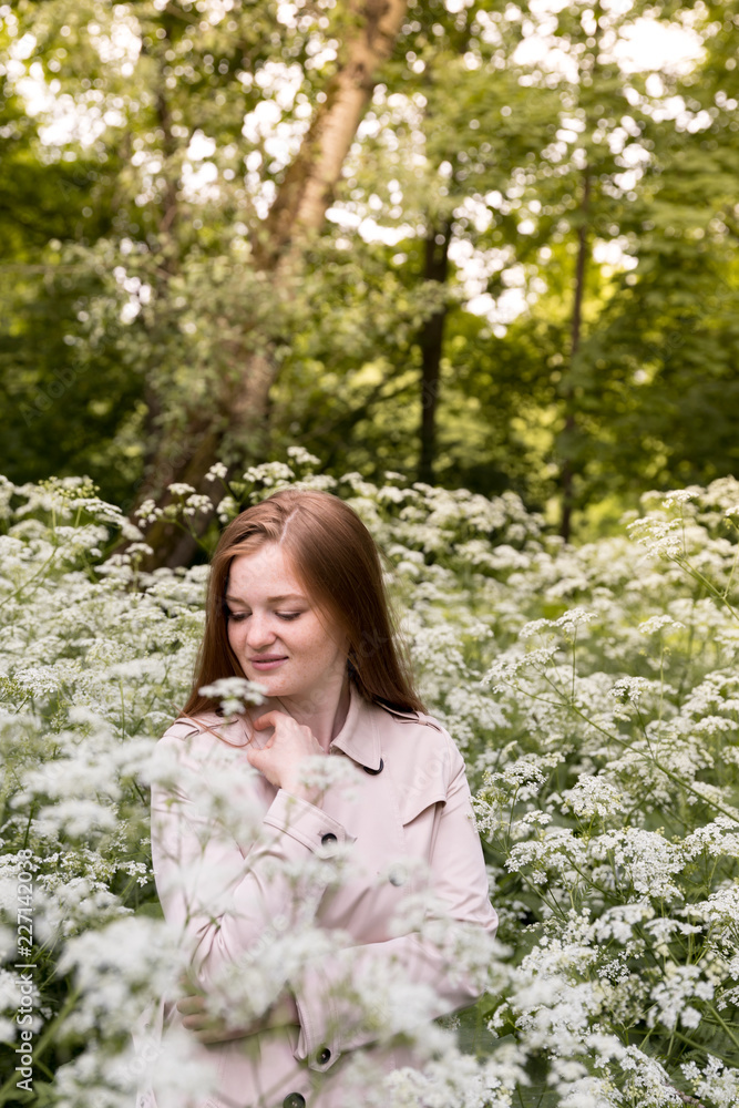 Woman in the green spring park. Life goals and balance Woman in the green spring park. Life goals and balance