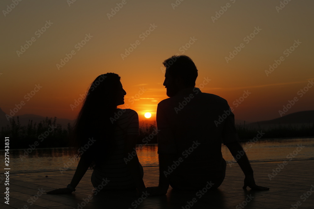  ROMANTIC COUPLE AT SUNSET