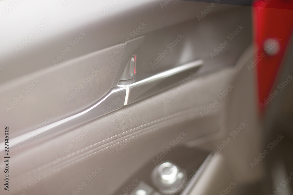 Fototapeta premium Car inside. New Modern interior of premium car with leather seats.