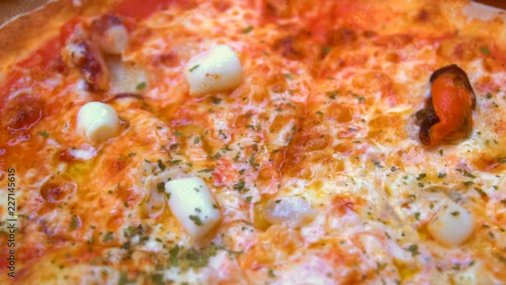 Crispy hot pizza with seafood. Crispy hot pizza with seafood.