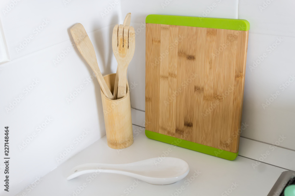 new wooden kitchen utensils, cozy new kitchen