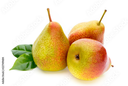 Fresh bio pear with leaves on isolated white background.