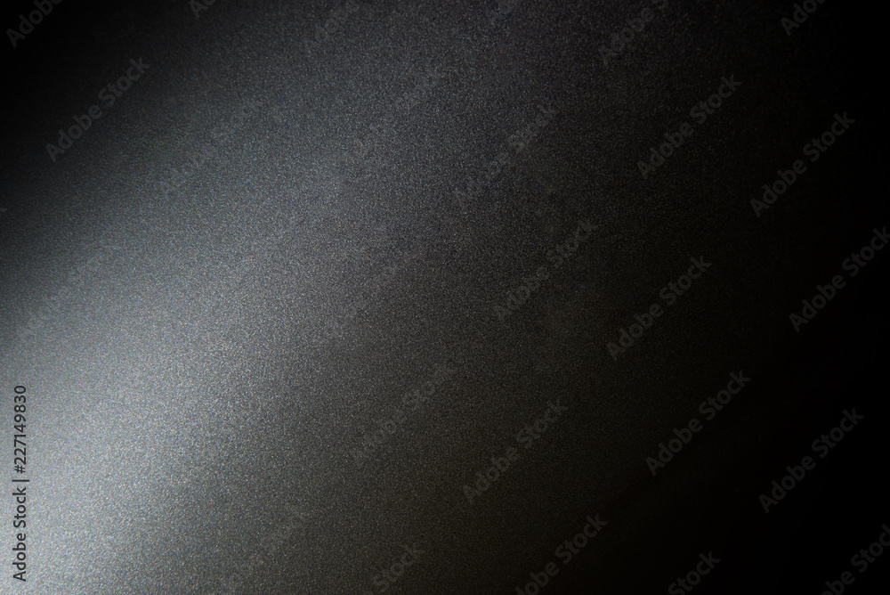 Texture of dark grey and light on surface of metal plate. Closeup for background. Texture of dark grey and light on surface of metal plate. Closeup for background.