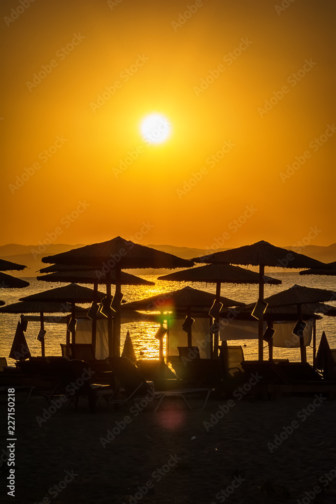 Fototapeta premium Early morning , dramatic sunrise over sea and mountain. Photographed in Asprovalta, Greece