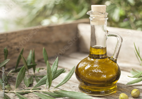 olive oil over wooden table