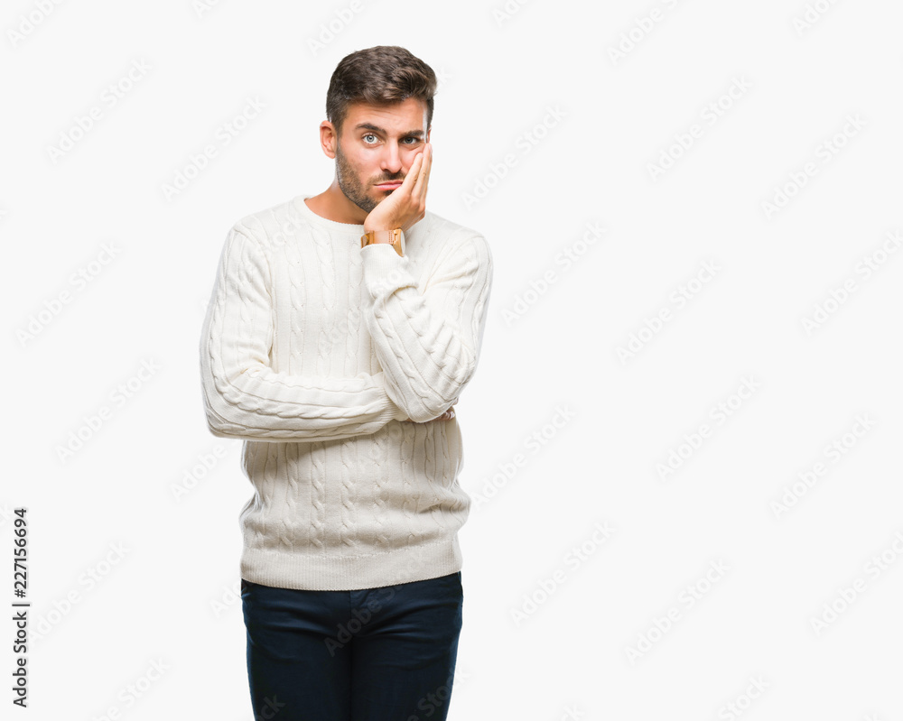 Young handsome man wearing winter sweater over isolated background thinking looking tired and bored with depression problems with crossed arms. Young handsome man wearing winter sweater over isolated background thinking looking tired and bored with depression problems with crossed arms.