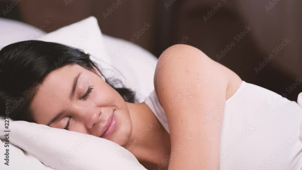 Attractive young girl at home. Sleeping in her bed Attractive young girl at home. Sleeping in her bed