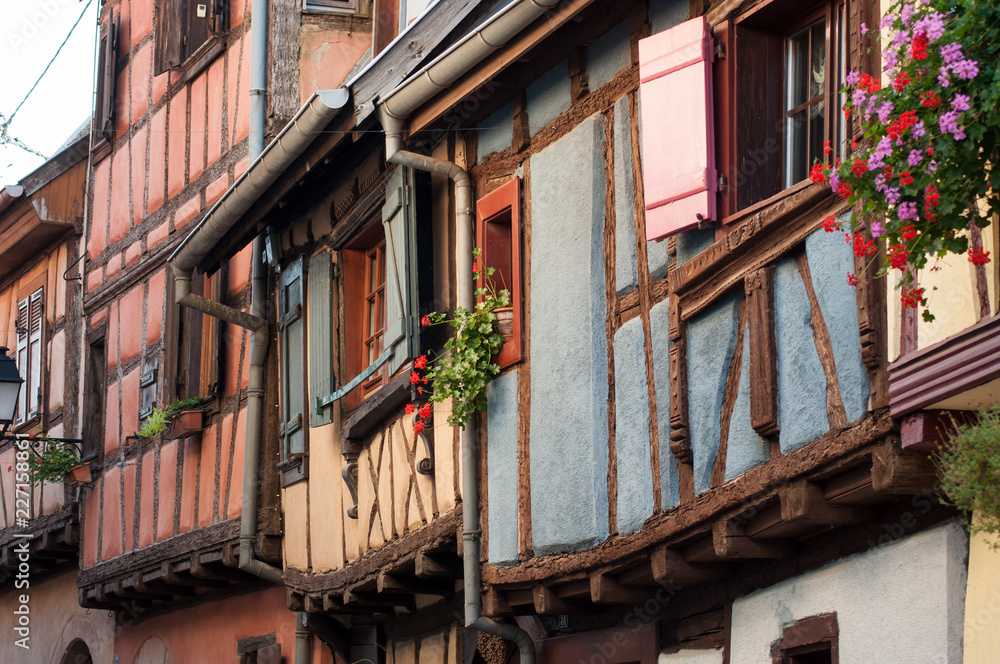 retail of traditional medieval architecture in the alsatian village of Eguisheim near Colmar - France