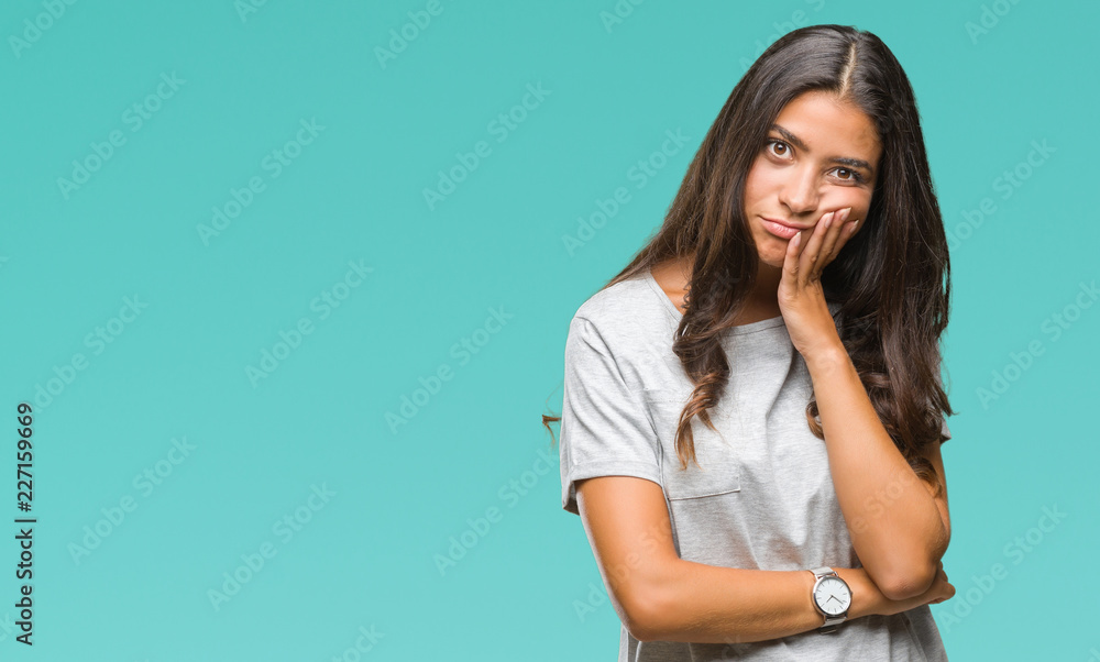 Young beautiful arab woman over isolated background thinking looking tired and bored with depression problems with crossed arms. Young beautiful arab woman over isolated background thinking looking tired and bored with depression problems with crossed arms.