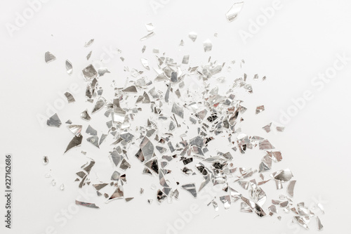 A shattered mirror on a white background