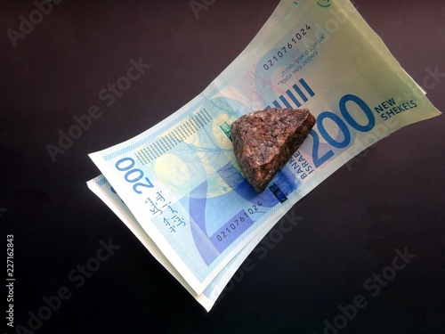 200 shekels, crushed by stone
