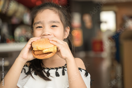 asian Children eat chicken cheese Hamburger Food Court
