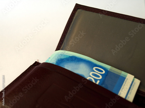 Shekels, money of Israel - 200 (two hundred) new shekels bills,50 (fifty) shekels bills, one hundred (100) shekels in the purse