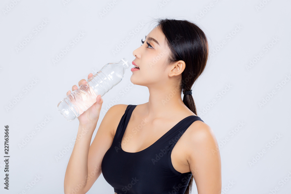 Beautiful portrait asian young woman bottle of water for healthy isolated on white background, girl with fit thirsty after exercise and fitness, health concept. Beautiful portrait asian young woman bottle of water for healthy isolated on white background, girl with fit thirsty after exercise and fitness, health concept.
