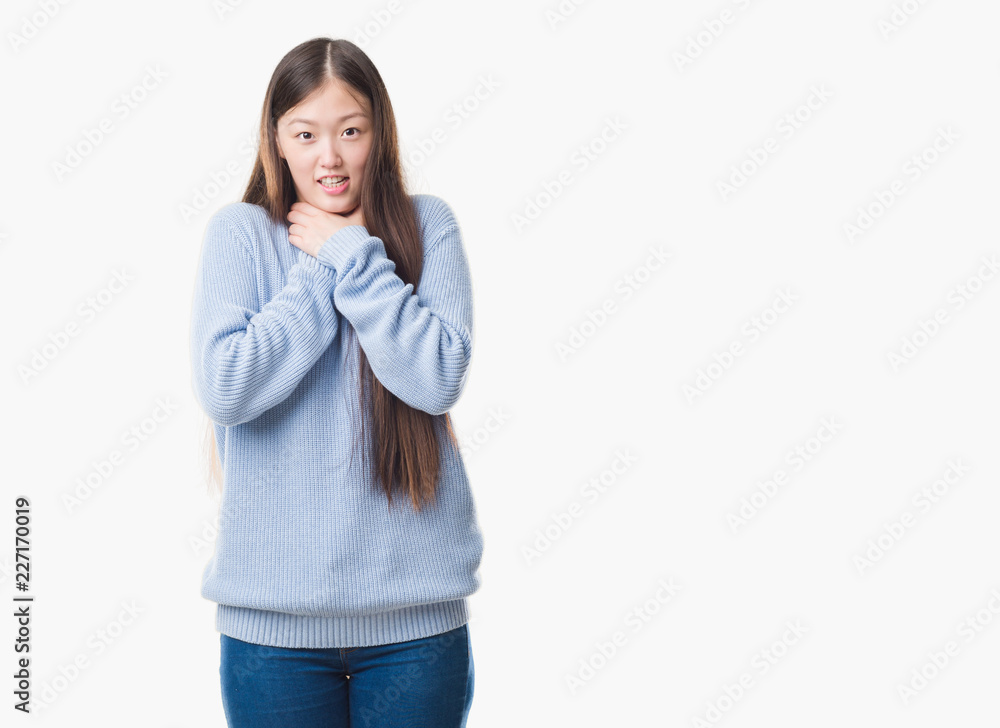 Young Chinese woman over isolated background shouting and suffocate because painful strangle. Health problem. Asphyxiate and suicide concept. Young Chinese woman over isolated background shouting and suffocate because painful strangle. Health problem. Asphyxiate and suicide concept.