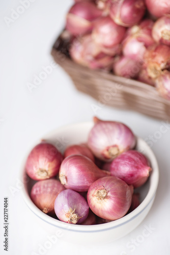 Red shallot onion in a bowl, herb and spice, food ingredient
