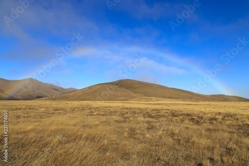 Rainbow over the grassland © mrpeak