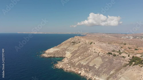 Aerial drone video from western Malta, Mgarr area, Fomm ir-Rih bay. photo