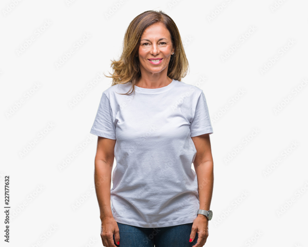 Middle age senior hispanic woman over isolated background with a happy and cool smile on face. Lucky person. Middle age senior hispanic woman over isolated background with a happy and cool smile on face. Lucky person.