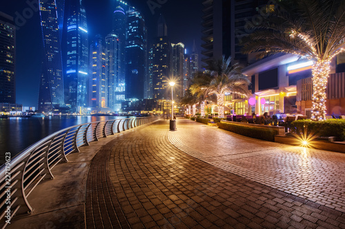 Beautiful view to Dubai Marina  UAE. Walking area. Long exposure time lapse effect at night