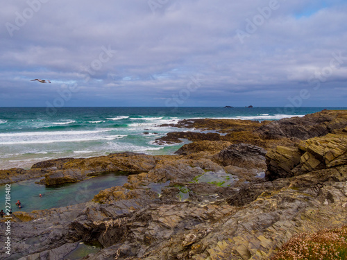 The rocky beach of Bedruthan Steps in Cornwall - an amazing landmark at the Cornish Coast