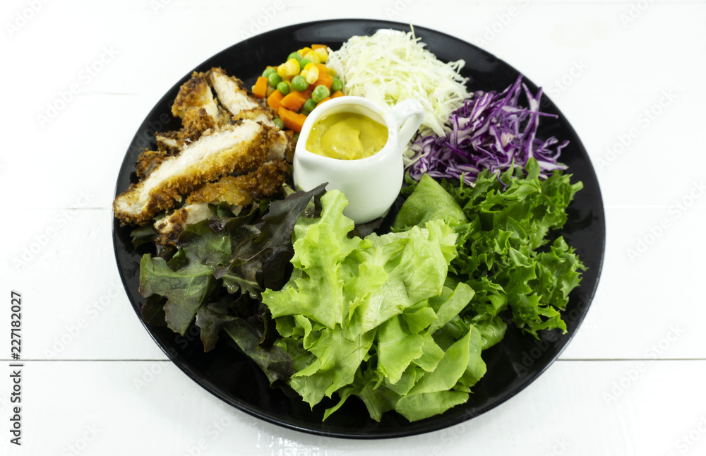 Fried chicken Salad in Plate on white background, Healthy salad diet food concept,Top view, with copy space for your text. Fried chicken Salad in Plate on white background, Healthy salad diet food concept,Top view, with copy space for your text.