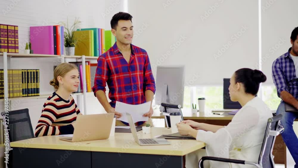 freestyle casual mixed-race people discussing with happiness at start-up office freestyle casual mixed-race people discussing with happiness at start-up office