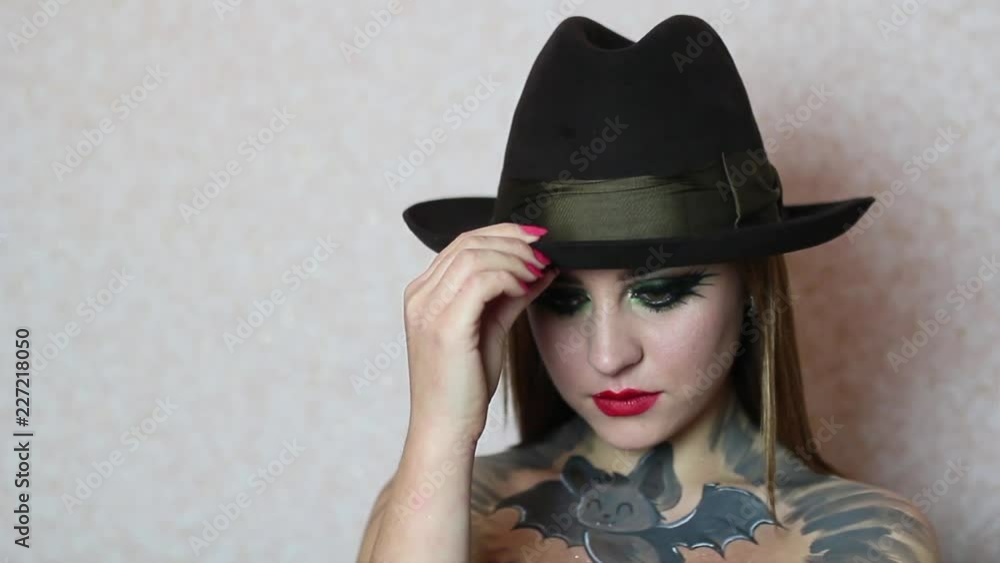 Halloween image, girl with halloween makeup, scary and beautiful face art Halloween image, girl with halloween makeup, scary and beautiful face art
