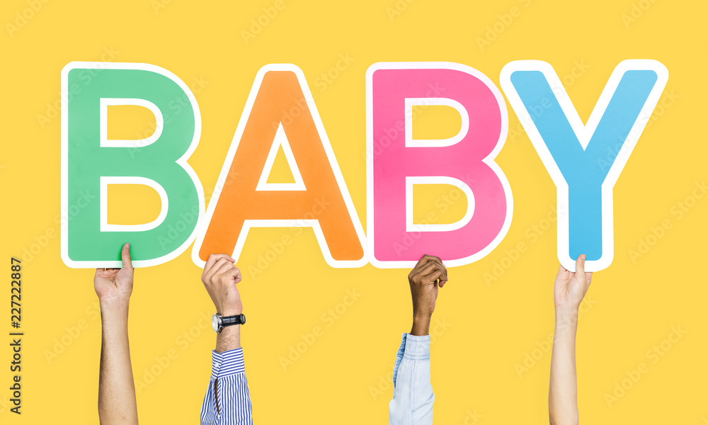 Hands holding the word baby Hands holding the word baby