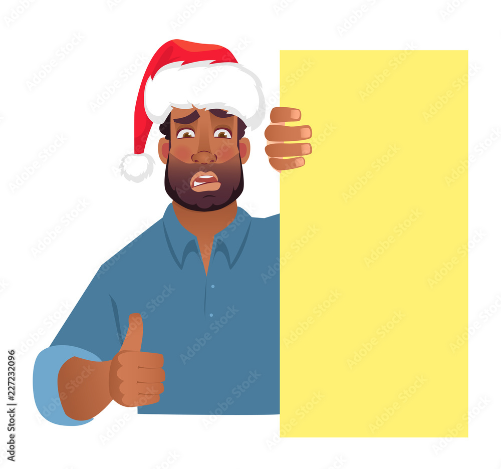 African man in hat holding blank banner.