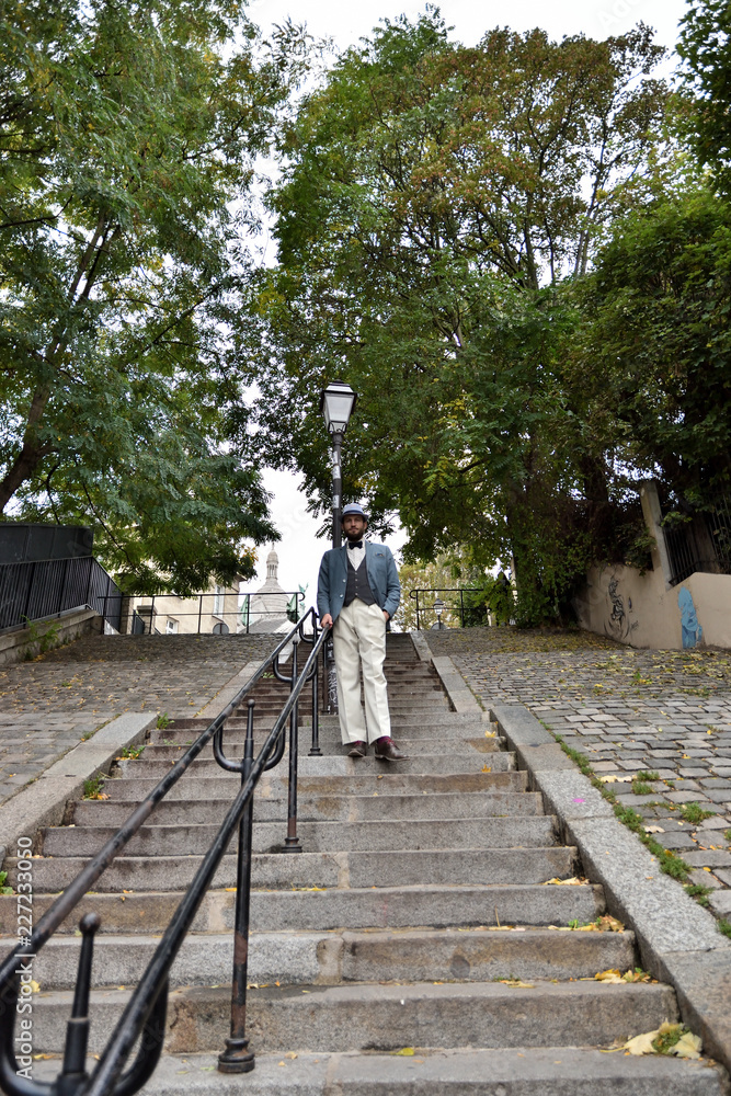 Young man in the stairs of Montmartre