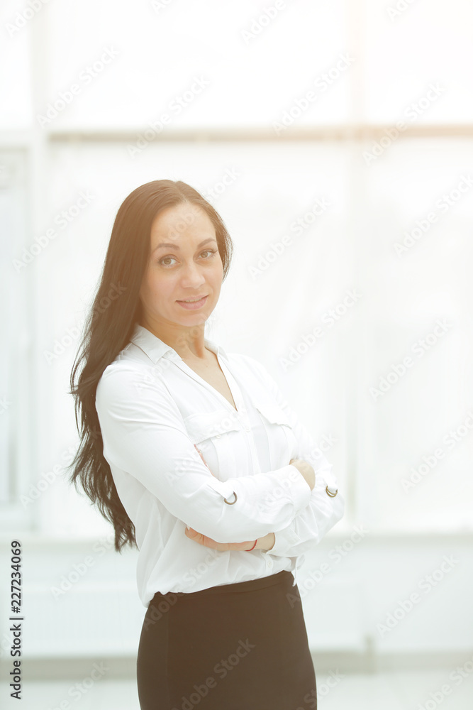 confident business woman on the background of office window confident business woman on the background of office window
