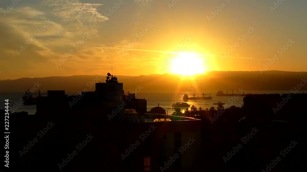 Sunset over the Gulf of Aqaba (part of the Red Sea) at Aqaba, Jordan, circa 2016 Sunset over the Gulf of Aqaba (part of the Red Sea) at Aqaba, Jordan, circa 2016