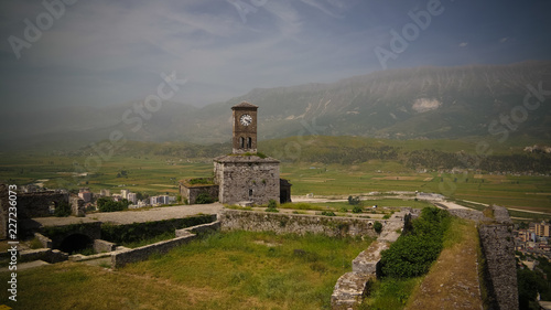Panoramic view to Gjirokastra castle with the wall  tower and Clock  Gjirokaster  Albania