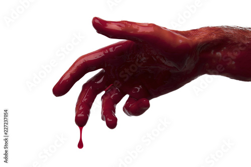 Bloody hand against a light background. halloween horror concept