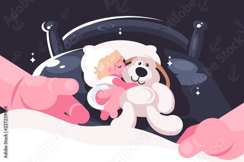 Baby sleeping in crib with toy teddy bear.