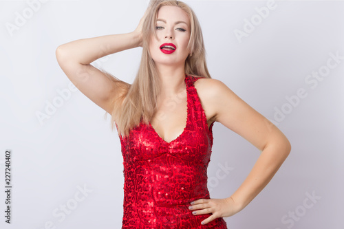 Blond woman in red evening dress