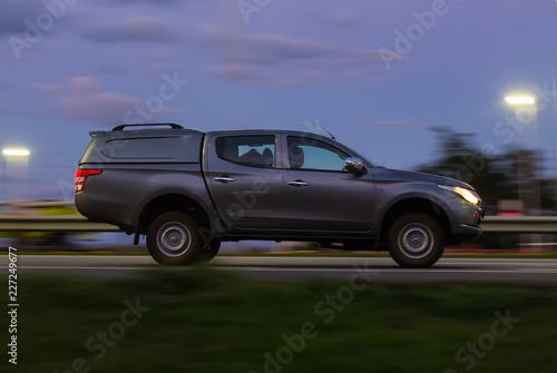 Pickup moves at high speed in the evening © Yuri Bizgaimer