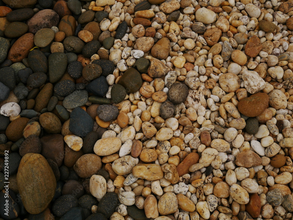 Naklejka premium pebbles on the beach