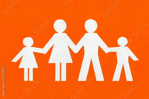 Obraz na płótnie happy paper family on a bright orange background. w salonie