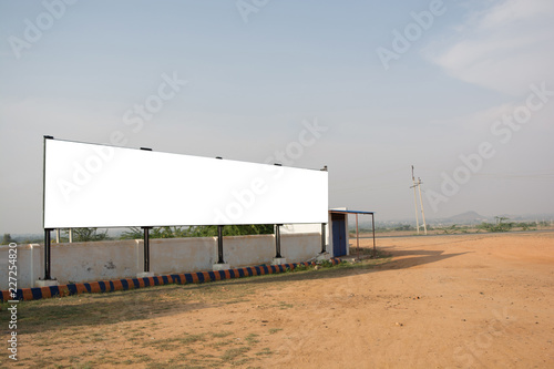 Big Blank billboard with white background space for advertisement in urban india.