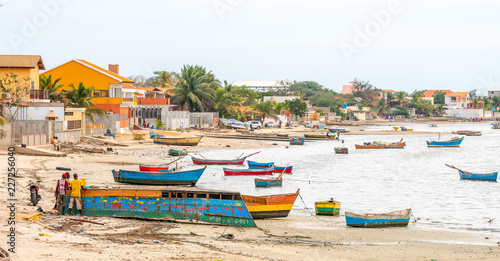 Angola Fishing town Ramiros, fisherman boats and fish for sale on the fish market in Angola West-Africa. photo