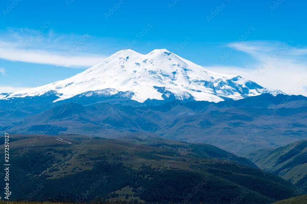Beautifull landscape view of the mount Elbrus - the highest mountain in Europe. Caucasus mountains at autumn season time. Beautifull landscape view of the mount Elbrus - the highest mountain in Europe. Caucasus mountains at autumn season time.